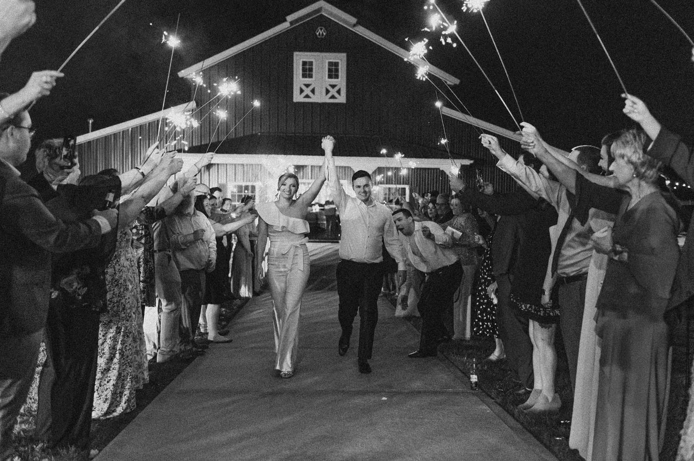 Guests celebrating with sparklers at Carrollock Farms